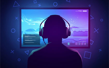 silhouette of a gamer in front of a monitor