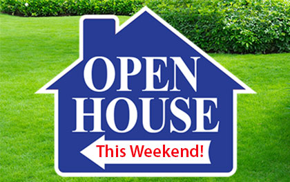 open house sign against a grass background