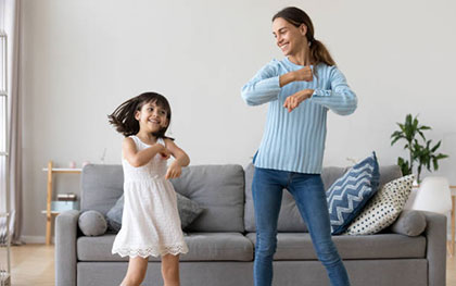 mother and daughter dancing