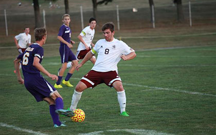 boys playing soccer