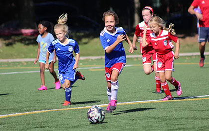 girls playing soccer