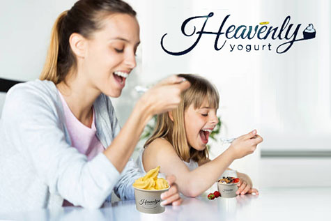 Mother daughter eating yogurt at Heavenly Yogurt