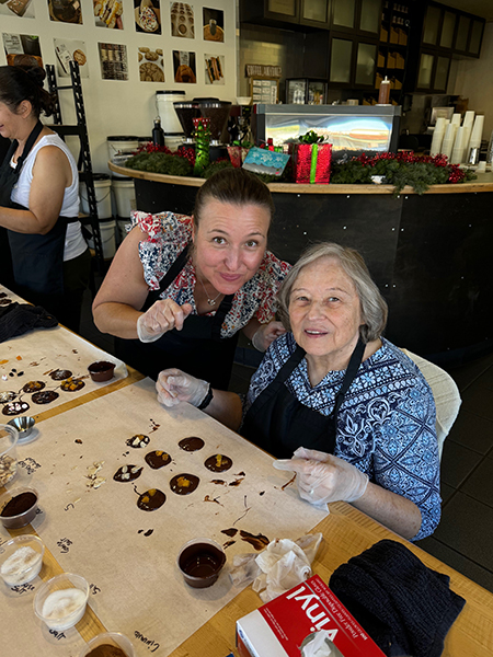 2 women at a crafts table