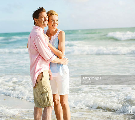Couple hugging at beach