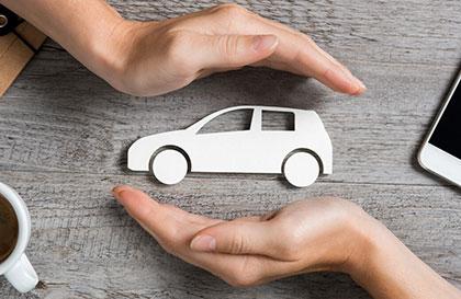 hands over an image of a car